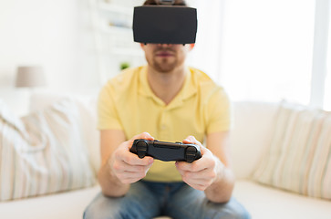 Image showing close up of man in virtual reality headset playing