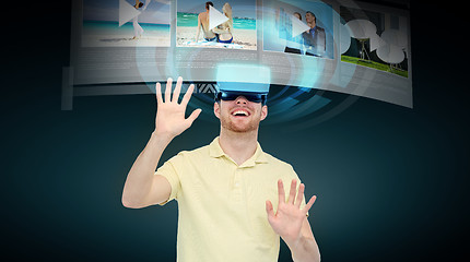 Image showing happy man in virtual reality headset or 3d glasses