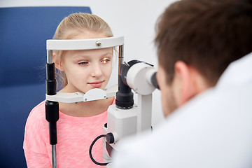 Image showing optician with tonometer and patient at eye clinic