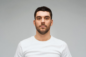 Image showing young man portrait over gray background