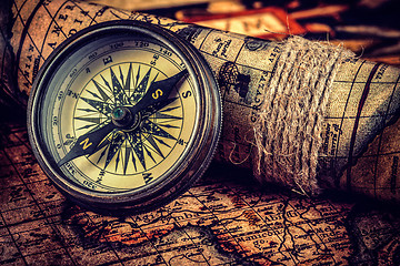 Image showing Old vintage compass on ancient map