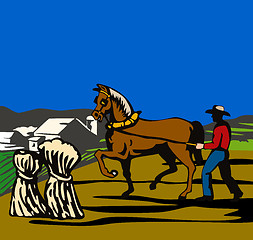 Image showing Farmer with horse and farmhouse in background