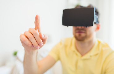 Image showing young man in virtual reality headset or 3d glasses