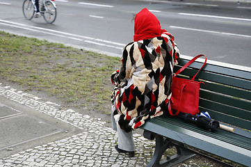 Image showing Lady looking at the traffic