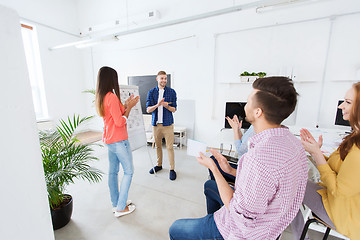 Image showing creative team celebrating success