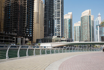 Image showing Dubai city center with skyscrapers and bridge