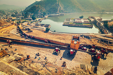 Image showing Tourists riding elephants on ascend to Amer fort