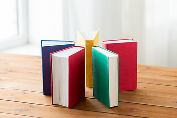 Image showing close up of books on wooden table