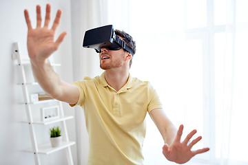 Image showing young man in virtual reality headset or 3d glasses