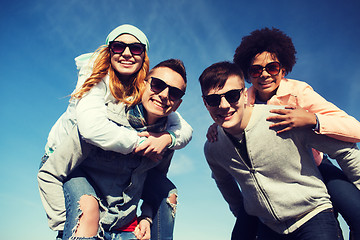 Image showing happy friends in shades having fun outdoors