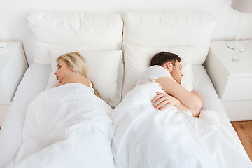 Image showing couple sleeping in bed at home