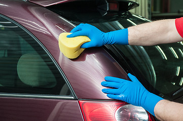 Image showing washing car with sponge