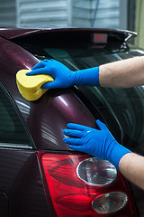 Image showing washing car with sponge