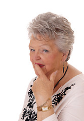 Image showing Skeptical looking senior woman.