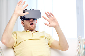 Image showing young man in virtual reality headset or 3d glasses