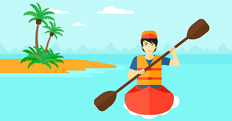 Image showing Man riding in canoe.