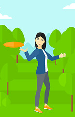 Image showing Woman playing flying disc.