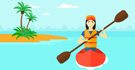 Image showing Woman riding in canoe.