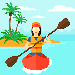 Image showing Woman riding in canoe.