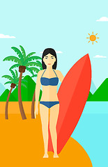 Image showing Surfer holding surfboard.