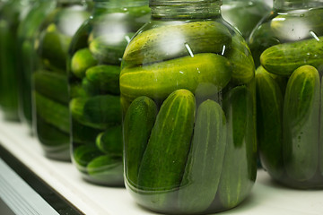 Image showing gurtsov conservation. Fresh cucumbers in jars