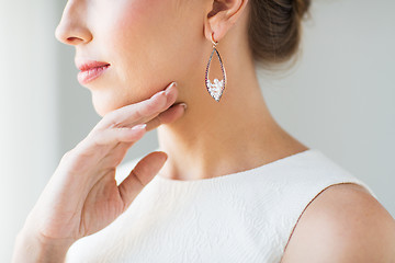 Image showing close up of beautiful woman face with earring