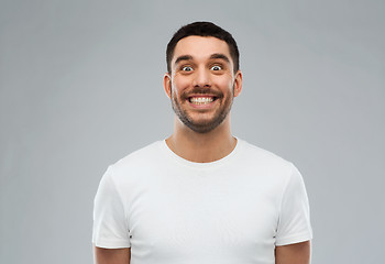 Image showing man with funny face over gray background