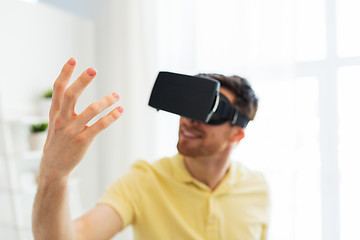 Image showing young man in virtual reality headset or 3d glasses