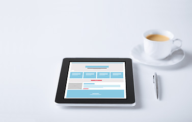 Image showing close up of tablet pc with web design template