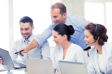 Image showing group of people working in call center