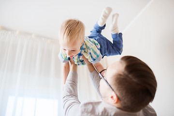 Image showing father with son playing and having fun at home