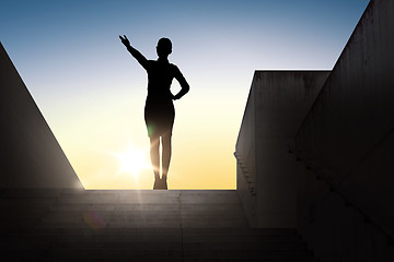 Image showing silhouette of business woman pointing hand