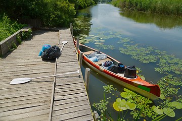 Image showing Canoe on the riverside