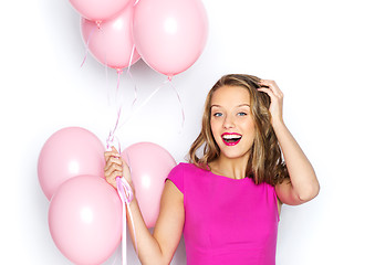 Image showing happy young woman or teen girl in pink dress