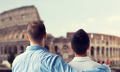 Image showing close up of male gay couple over coliseum in rome