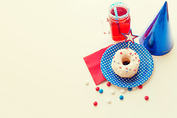 Image showing donut with juice and candies on independence day