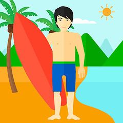 Image showing Surfer holding surfboard.