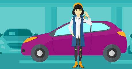 Image showing Woman holding keys from new car.