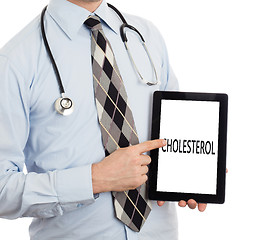 Image showing Doctor holding tablet - Cholesterol