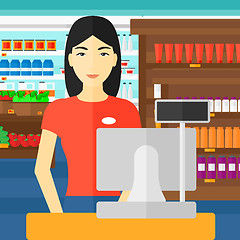 Image showing Saleslady standing at checkout.