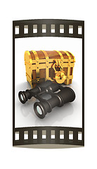 Image showing binoculars and chest. The film strip