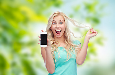 Image showing happy young woman or teenage girl with smartphone