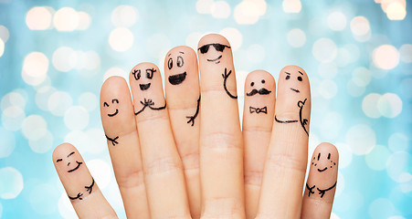 Image showing close up of hands and fingers with smiley faces