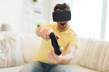 Image showing close up of man in virtual reality headset playing