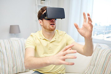 Image showing young man in virtual reality headset or 3d glasses