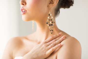 Image showing close up of beautiful woman with earrings