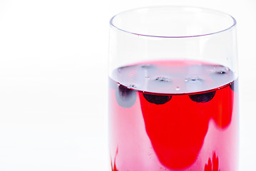 Image showing Glass of aronia juice with berries