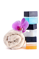 Image showing Stack of spa accessories with flower 