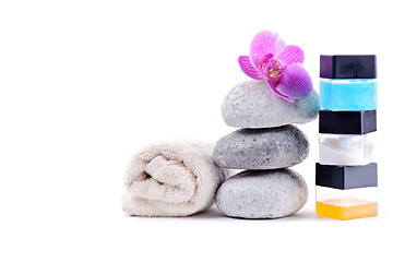 Image showing Stack of spa stones with flower 