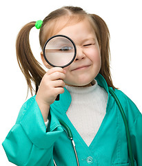 Image showing Cute little girl is playing doctor